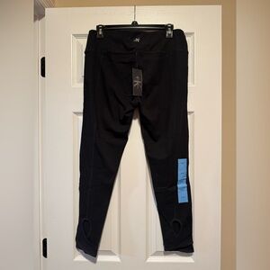 CK performance black keyhole leggings L